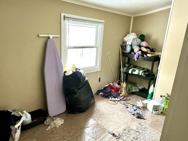 laundry room with crown molding