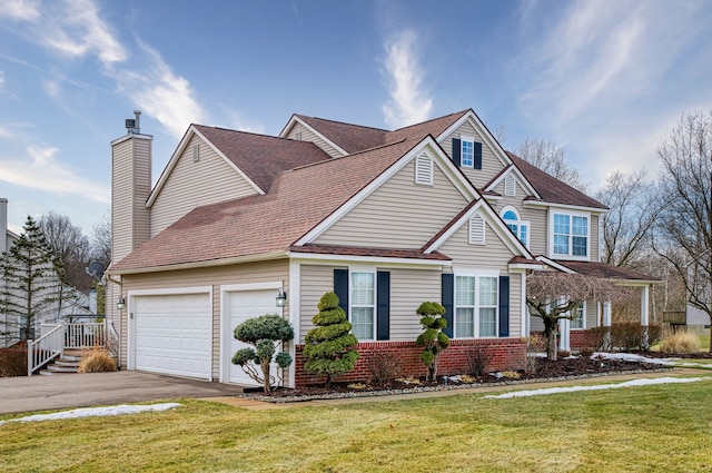 view of front of home featuring brick siding, a shingled roof, a chimney, aphalt driveway, and a front yard