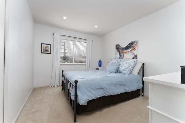 bedroom with recessed lighting, baseboards, and light colored carpet