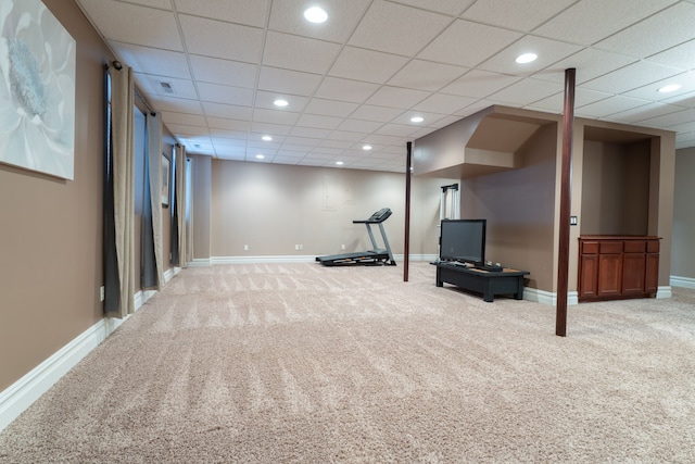 exercise room with baseboards, carpet floors, and recessed lighting