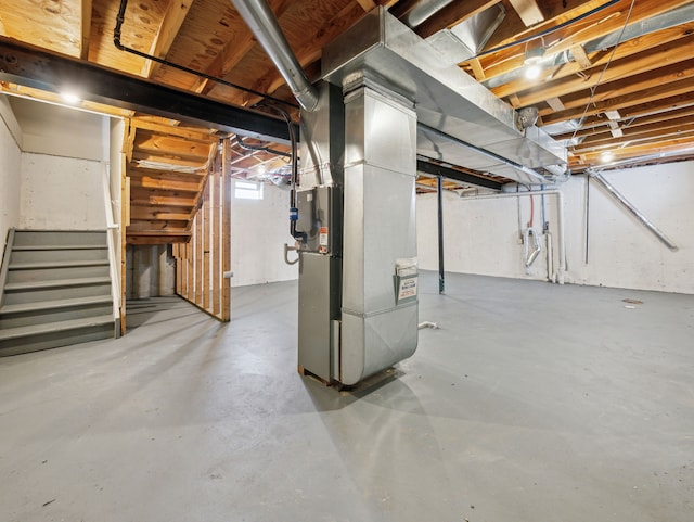 basement featuring heating unit