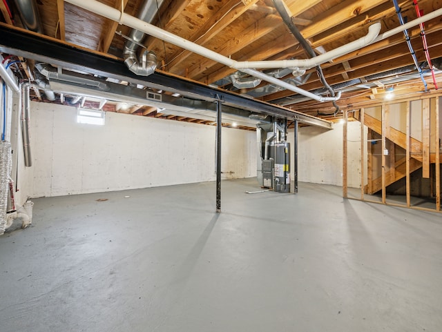 basement featuring water heater