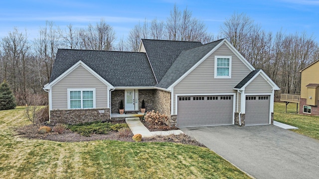 traditional home featuring brick siding, driveway, a shingled roof, and a front yard