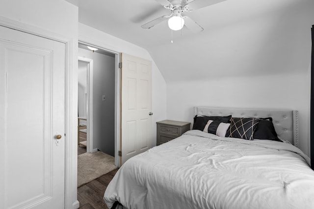 bedroom featuring vaulted ceiling, ceiling fan, and wood finished floors