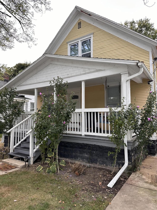 view of home's exterior with covered porch