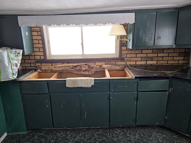 kitchen with dark countertops