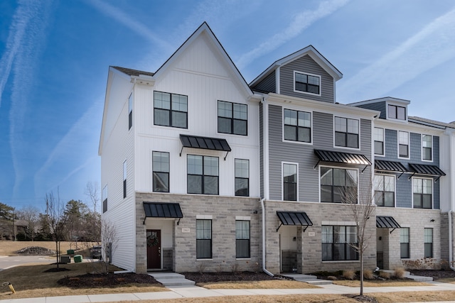 multi unit property with stone siding