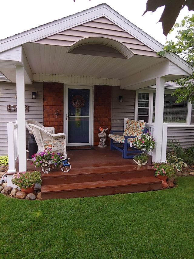 exterior space with a yard and covered porch