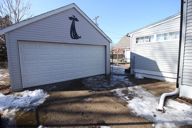 detached garage with fence