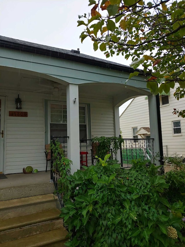 entrance to property with covered porch