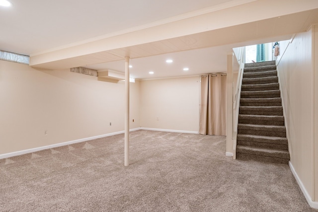 below grade area featuring recessed lighting, carpet flooring, baseboards, and stairs