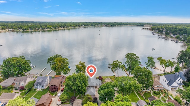 aerial view featuring a water view and a residential view