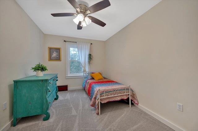 bedroom featuring carpet floors, ceiling fan, and baseboards