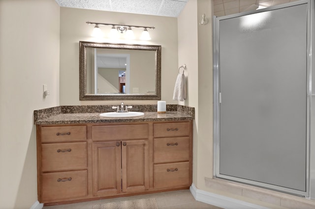 full bath featuring a shower stall and vanity