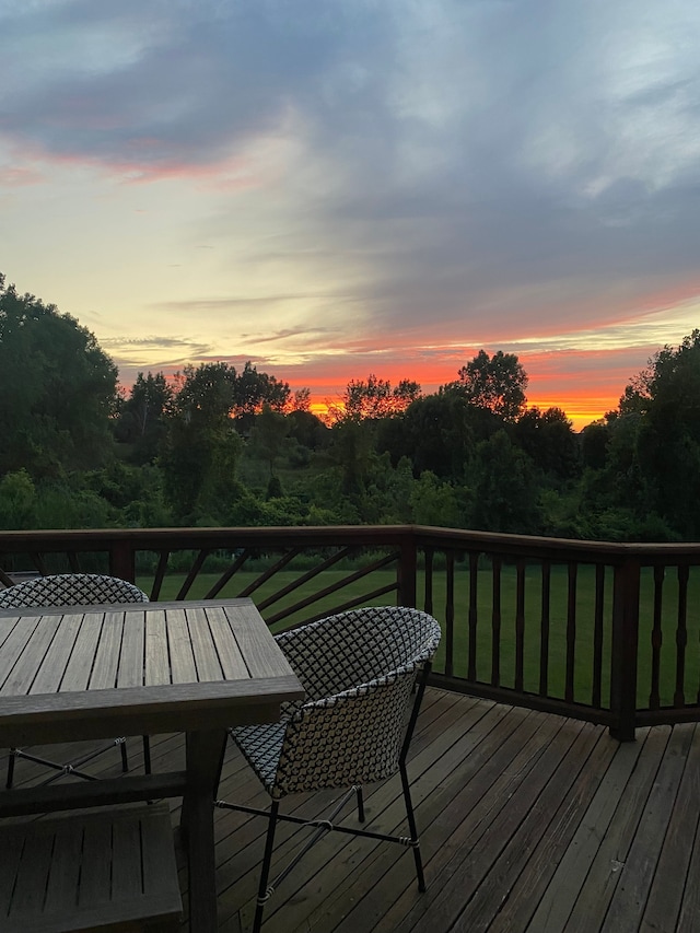 wooden deck with outdoor dining space