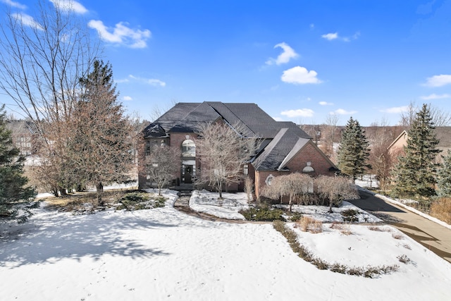 view of front of home with brick siding