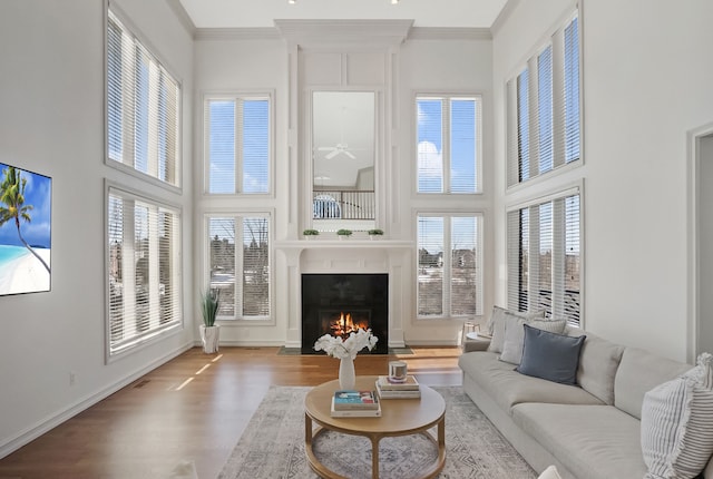 sunroom featuring a large fireplace