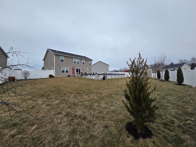 view of yard featuring a fenced backyard