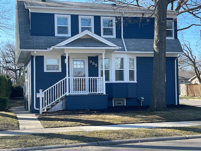 view of front of home with roof with shingles