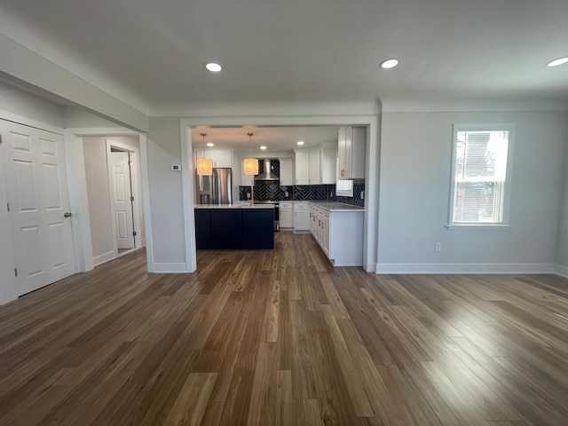 kitchen featuring dark wood-type flooring, white cabinetry, open floor plan, stainless steel refrigerator with ice dispenser, and decorative light fixtures