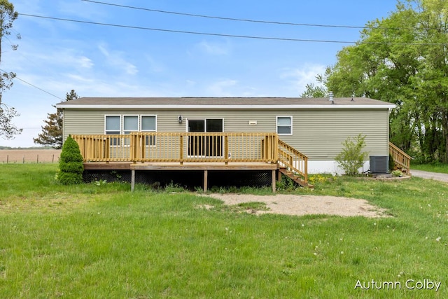 5443 Gravel Ridge Rd, Lakeview, MI 48850 - rear view of house with a wooden deck, central AC, and a yard
