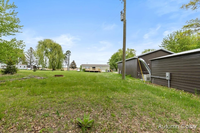 5443 Gravel Ridge Rd, Lakeview, MI 48850 - view of yard featuring a pole building and an outdoor structure