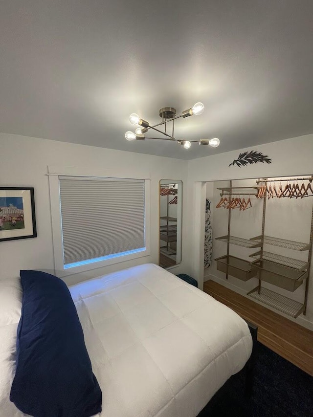 bedroom featuring wood finished floors