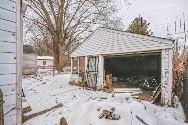 view of snow covered garage