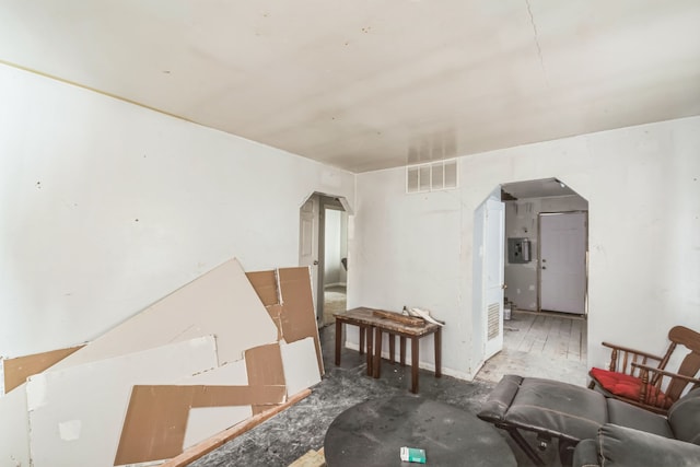 dining room featuring arched walkways and visible vents