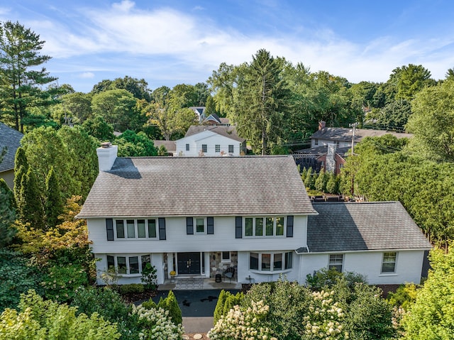 view of front of property featuring a chimney