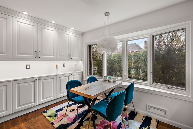 dining space featuring visible vents, dark wood-type flooring, and recessed lighting