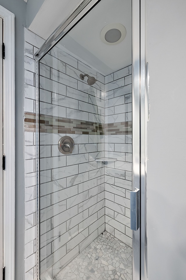 full bathroom with a stall shower