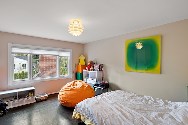 bedroom featuring dark wood-type flooring