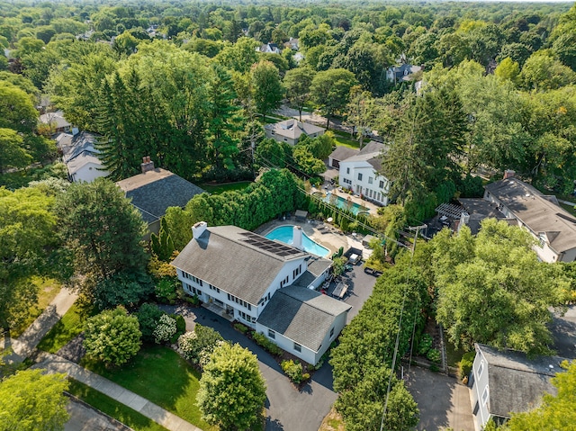 bird's eye view with a residential view and a view of trees