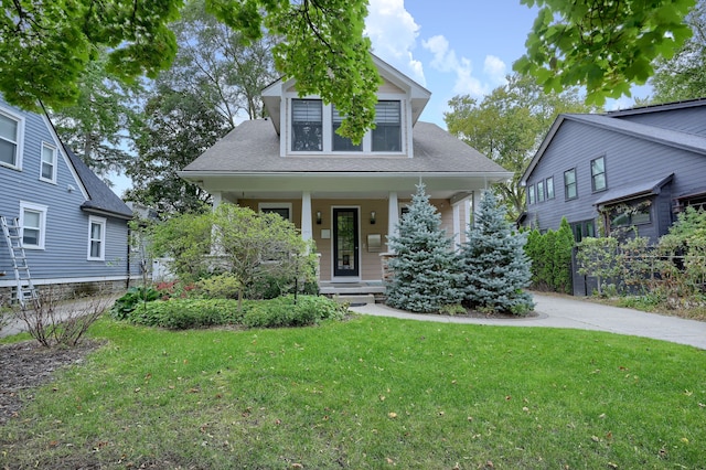 view of front of house featuring a front lawn and a porch