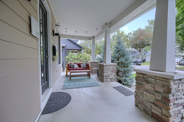 view of patio featuring covered porch