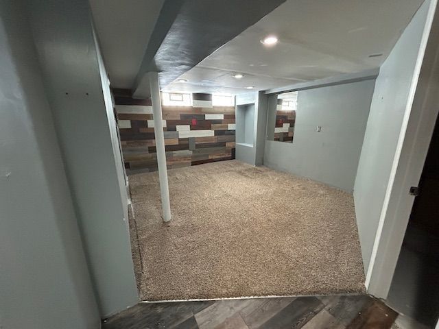 basement featuring recessed lighting