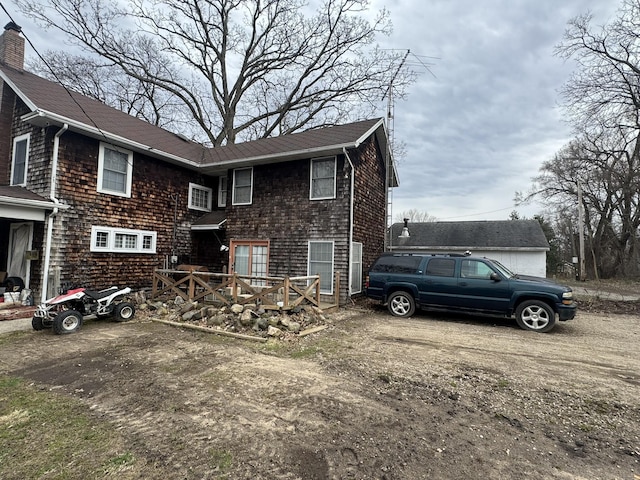view of front facade featuring a wooden deck