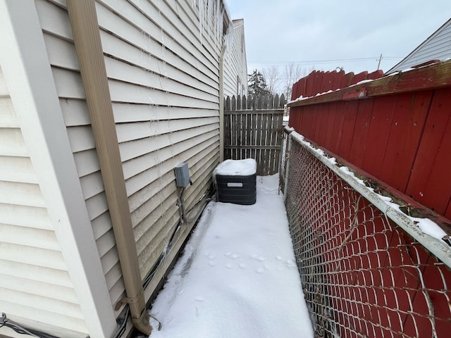 view of home's exterior with fence