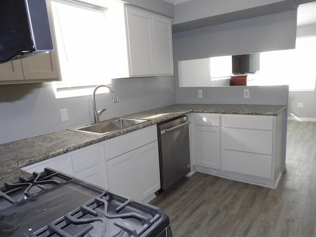 kitchen featuring a sink, white cabinets, dishwasher, and range with gas cooktop