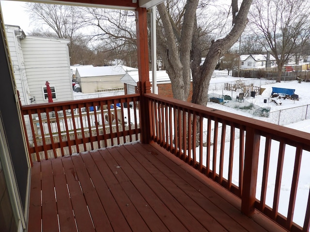 view of snow covered deck