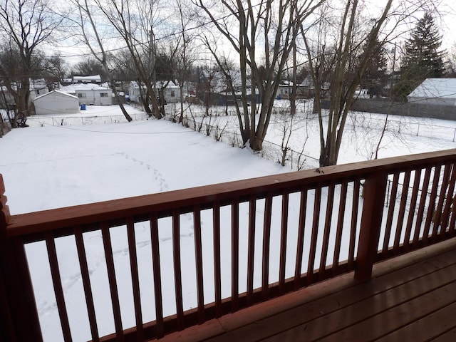 view of snow covered deck