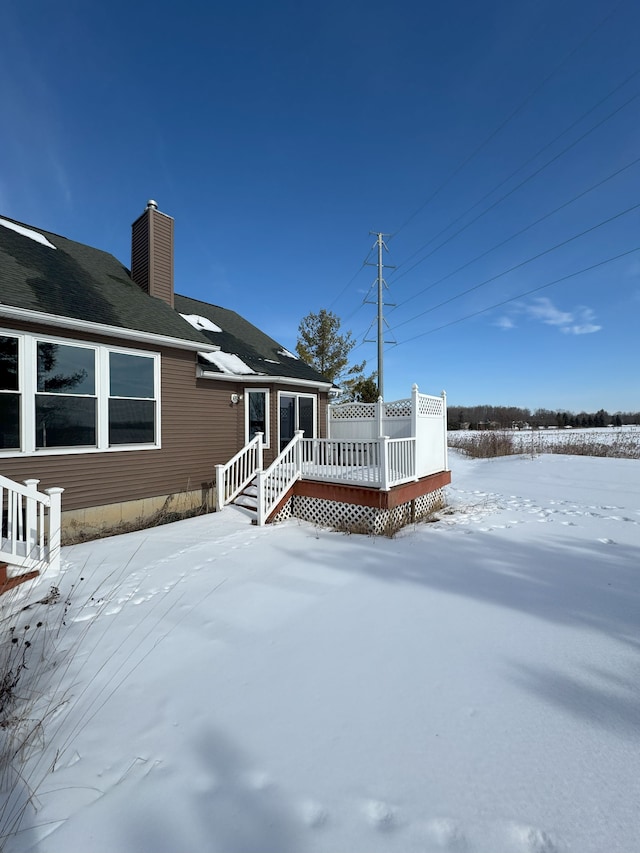 view of snow covered deck