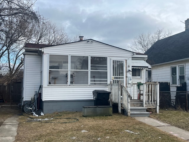 view of front of property with fence