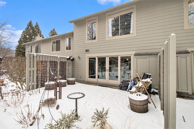 back of house with french doors and a patio area