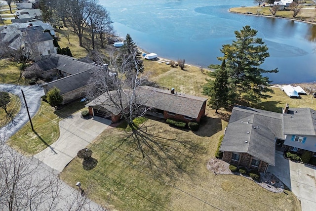 bird's eye view with a water view