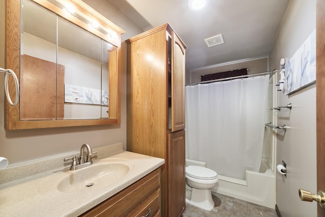 bathroom with toilet, visible vents, and vanity