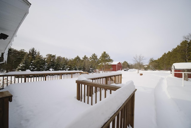 view of snow covered deck