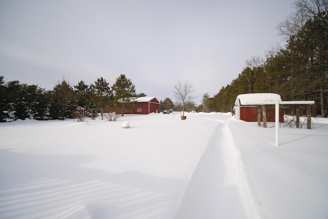 view of yard covered in snow