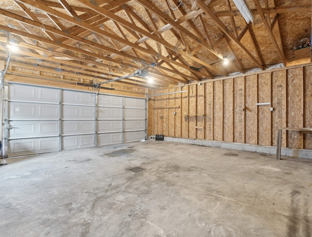 garage featuring a garage door opener